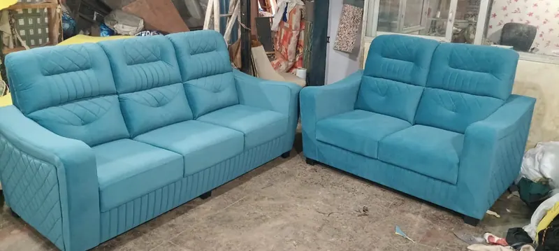 Teal 3+2 sofa set finished on the workshop floor before delivery